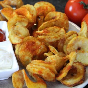 Pommes-Chips-die-frau-am-grill
