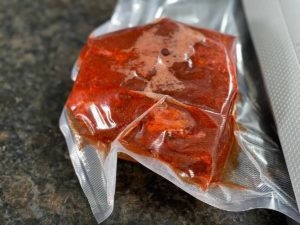 gewuerzten schweinehals vakuumieren