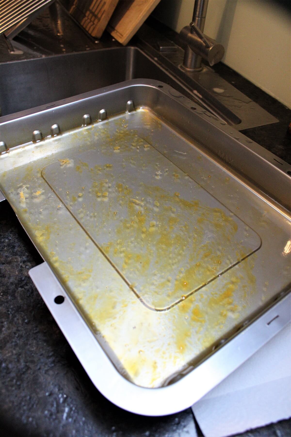 wasserschale elektrogrill reinigen
